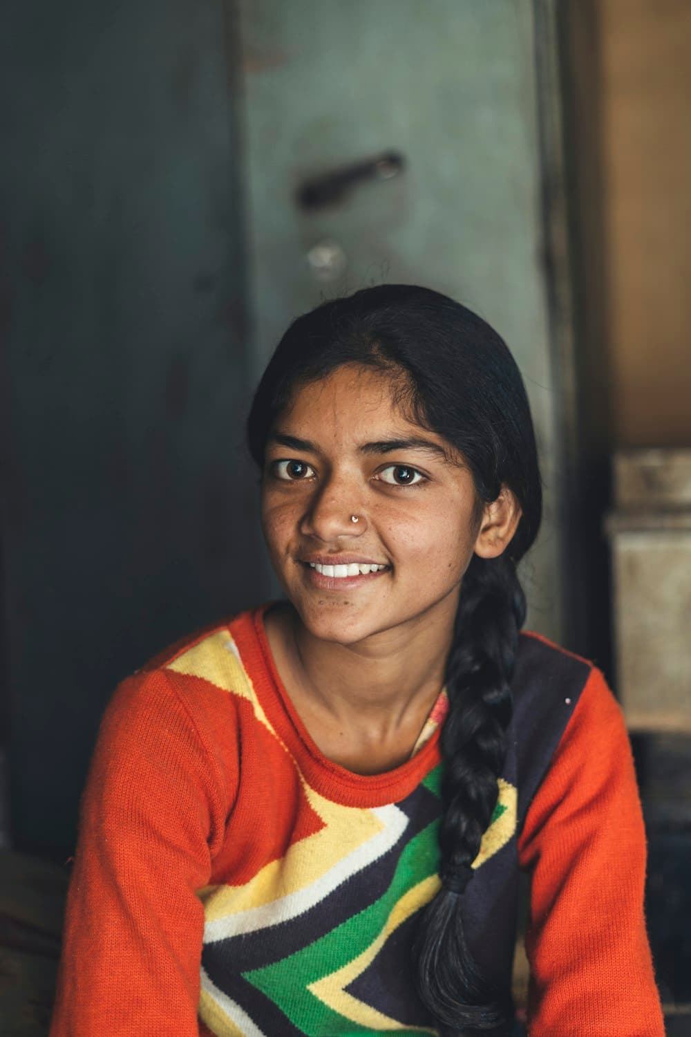 A young woman smiling