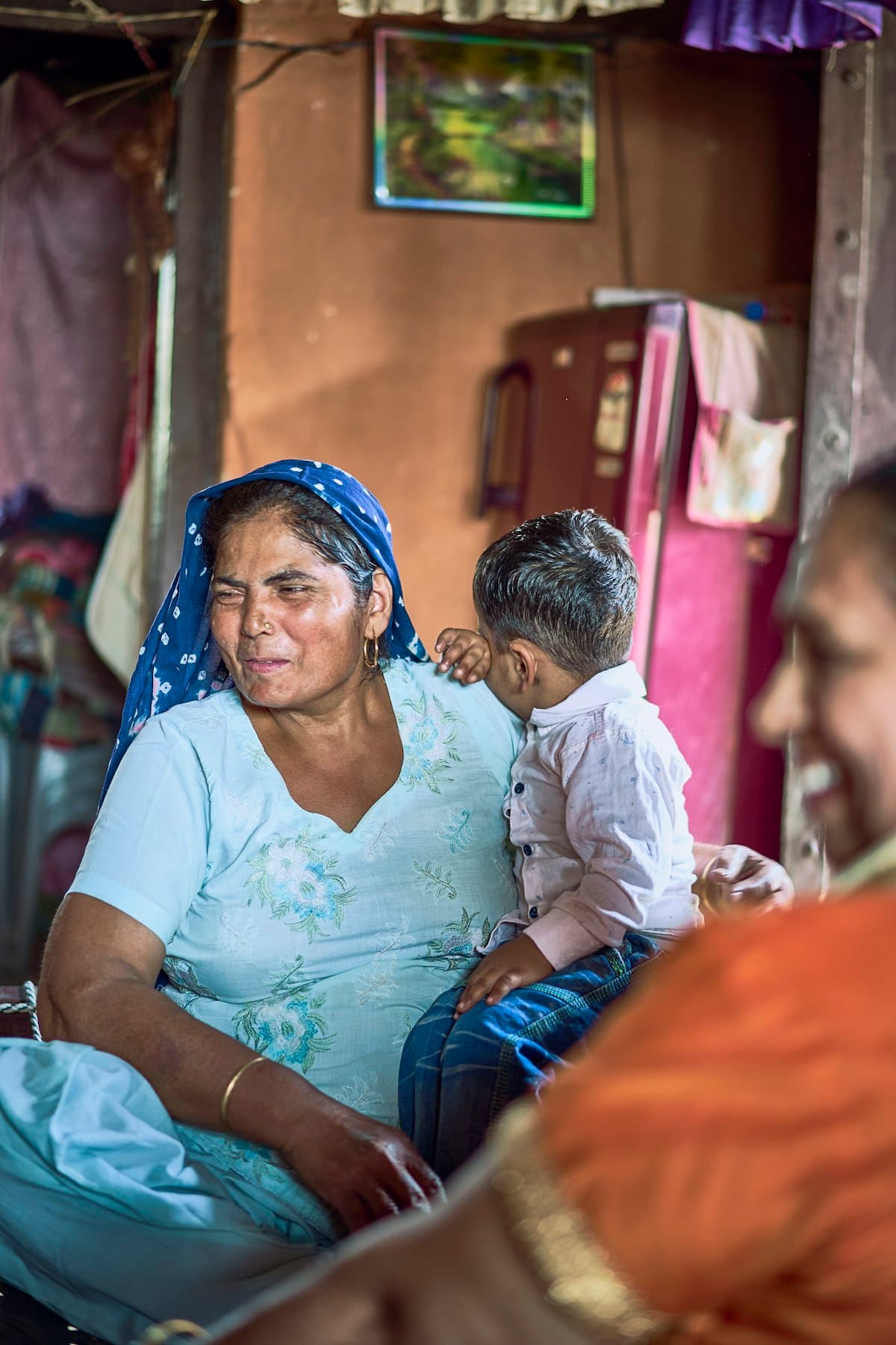 A mother sitting with her young son